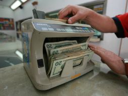 La cotización del dólar en esta semana arrancó con retroceso. ARCHIVO /