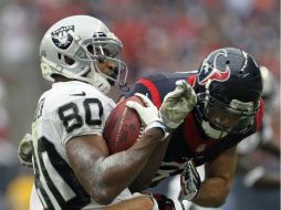 Los Texanos tuvieron la oportunidad de darle la vuelta al marcador en el último minuto. AP /