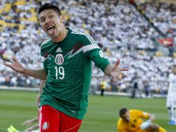 Los festejos no fueron sólo por el pase al Mundial, sino por la forma en que se logró: con un Oribe Peralta fino de cara a gol. AP /