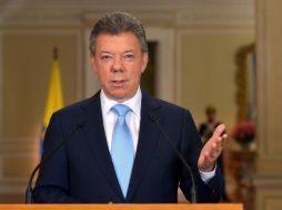Juan Manuel Santos termina su mandato en 2014 y podría ser reelecto para ser presidente hasta 2018. AFP /