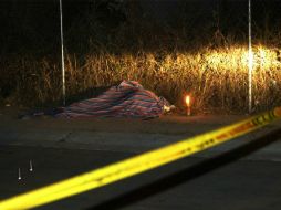 Elementos forenses del Estado iniciaron las investigaciones del posible feminicidio. ARCHIVO /