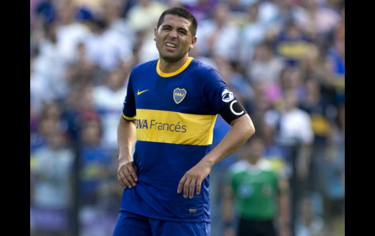 Juan Román Riquelme ha sufrido este 2013 con su preparación física. AP /