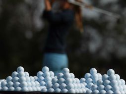 El astronauta Alan Sheopard decidió jugar golf en la Luna, y es que 'por casualidad' llevaba consigo un palo y varias pelotas. ARCHIVO /