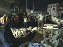 El movimiento telúrico destruye cerca de 250 residencias y comercios. AFP /