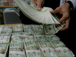 El dólar ha ganado terreno sobre el peso en las últimas jormadas. ARCHIVO /