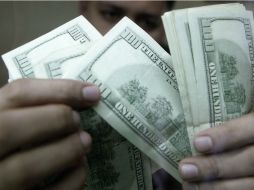 El peso pudo ganar un poco de terreno en la jornada cambiaria de este martes. ARCHIVO /