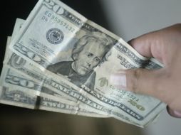 Por segundo día consecutivo. el dólar bajó en su cotización. ARCHIVO /