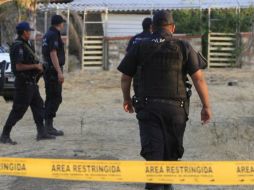 Las autoridades acudieron al lugar para iniciar con las investigaciones. ARCHIVO /