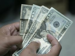 La moneda extranjera sigue bajando en su cotización. ARCHIVO /