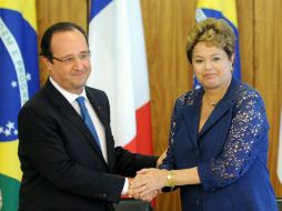 La visita tiene un fuerte peso económico, con una nutrida misión empresarial francesa de alto nivel. AFP /