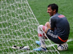 Michel ya no entrena con el primer equipo del Guadalajara; lo hace por separado en el gimnasio. MEXSPORT /