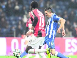 Héctor Hérrera anotó el cuarto gol de los Dragones. AP /