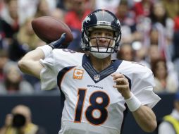 Manning se conectó con Julius Thomas para lograr su pase de anotación número 51 de la campaña. AP /
