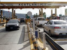 Rumbo a Manzanillo hay que pagar tres casetas, la primera en Acatlán de Juárez de 121 pesos; sigue una más de 121 y otra de 119 pesos. ARCHIVO /
