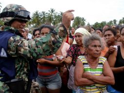 Los damnificados mantuvieron un bloqueo durante cuatro horas y media en la carretera Chilpancingo-Chilapa. ARCHIVO /