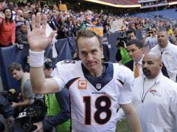 Manning estableció nuevas marcas para un pasador al cierre de la temporada regular 2013 de la NFL. ARCHIVO /