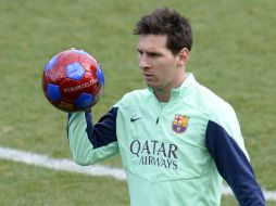 El timonel argentino añade que la vuelta de Messi a las canchas se dará ''conforme él se vaya sintiendo''. AFP /