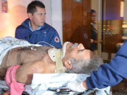 José Mireles es trasladado en un helicóptero oficial de la Policía Federal en medio de un fuerte dispositivo de seguridad. AP /