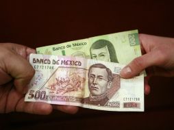 Una reducción del programa de estímulos de la reserva significaría una depreciación temporal de la moneda mexicana. ARCHIVO /