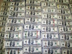 El tipo de cambio para solventar obligaciones en moneda extranjera es de 13.0846 pesos. ARCHIVO /