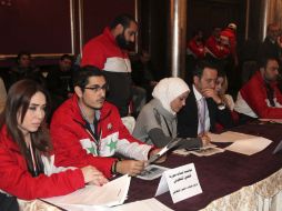 Miembros de las juventudes sirias confían al gobierno sirio su representación en la Conferencia de Ginebra. EFE /