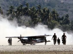 Al lugar llegaron elementos de la Armada de México, Ejército Mexicano, Policía Federal y Policía Municipal. AFP /