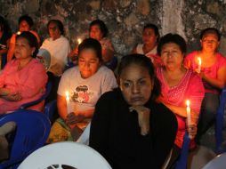 Más de 30 personas en Morelos aguardan a la medianoche para conocer la decisión de la Corte. SUN /