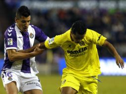 A media hora de juego 'Gio' disparó el balón, pero sin resultado favorable. AFP /