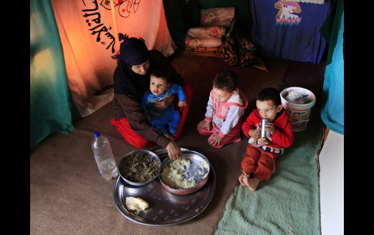 Casi 40 localidades de Damasco Rural permanecen aisladas, falta distribuir alimentos a 800 mil personas. ARCHIVO /