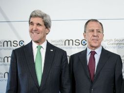 John Kerry y Sergey Lavrov, las diferencias entre Occidente y Rusia están bloqueando la solución de los conflictos en Siria y Ucrania. AFP /