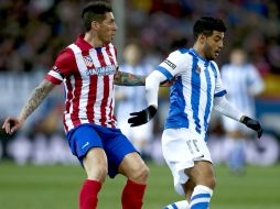 Carlos (d) pide que terminen las especulaciones sobre su ausencia en las convocatorias. EFE /