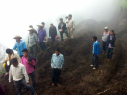 Los manifestantes piden la reubicación de 200 personas que viven en zonas de riesgo tras el paso de la tormenta. ARCHIVO /