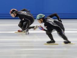Los integrantes del equipo de EU practican previo a las competencias. AP /