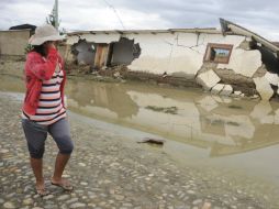 Se iniciará con la reconstrucción de casas, reconstrucción y apoyo a los cultivos afectados. AP /