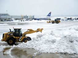 La expectativa es que la nevada se convierta en una precipitación de lluvia congelante en la tarde. EFE /