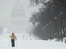 Vista del capitolio en medio de la nevada que provocó el cierre de escuelas y dejó hasta 30 centímetros de nieve. AFP /