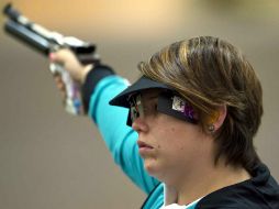 Este año, la tiradora de 29 años inició su preparación en una gira por Europa. ARCHIVO /