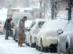 Al menos 114 centímetros de nieve cubrieron algunas regiones de Japón. ARCHIVO /