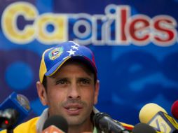 Capriles ha confirmado que este lunes concurrirá al palacio presidencial para atender un llamado de Maduro. EFE /