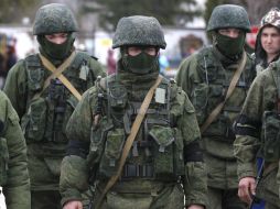 Putin reconoce un total de 22 mil militares en Crimea, pero subraya que ello ha sido ''sin siquiera un disparo'' o enfrentamiento. AP /