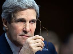 John Kerry señala que busca maneras de lograr que el presidente de Venezuela celebre un diálogo con sus ciudadanos. AFP /