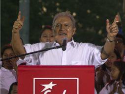 Salvador Sánchez Cerén ganó la presidencia de El Salvador con un margen corto frente a su adversario Norman Quijano. AP /