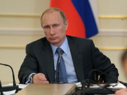 Vladimir Putin firmó el martes el tratado por el cual Crimea se integra la Federación de Rusia. AFP /