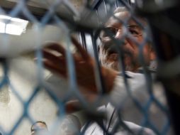 ''No los maté'', afirma Hipólito Mora tras la rejilla de prácticas en relación a los dos homicidios por los que fue consignado. AFP /