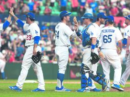 Vengan esos cinco. Una proyección estimada de la nómina de los Dodgers, los ubican con un total de 235 millones de dólares. AP /
