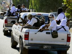 Esta semana los grupos civiles armados ocuparon los municipios de Huetamo y Tacámbaro. ARCHIVO /