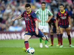 El Barcelona gana 3-1 al colista Betis con un doblete del argentino Lionel Messi. AP /