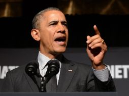 Obama busca movilizar a los electores demócratas a resistirse a los requisitos estatales para sufragar. AP /