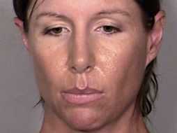 La mujer, identificada como Alison Ernst, de 36 años, enfrenta un cargo de alteración del orden público. AP /