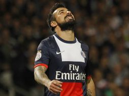 El campeón de la liga francesa, PSG, habría inclumplido esta normativa según un diario inglés. AFP /